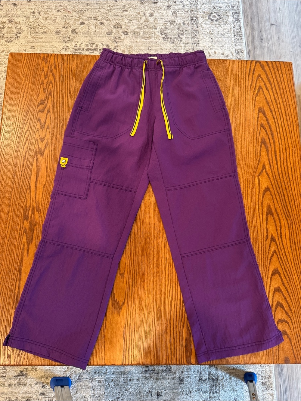 WonderWink Purple Cargo scrub bottoms with Yellow Drawstring